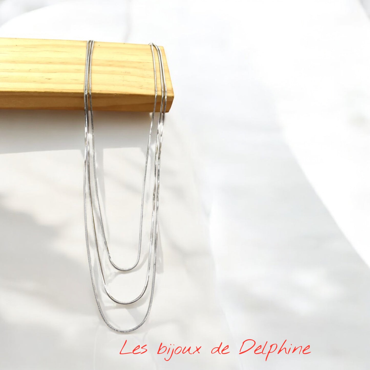 Collier triple rang