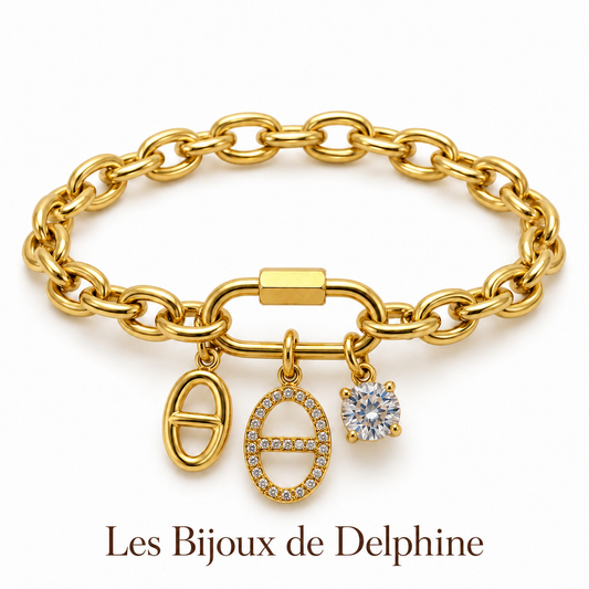 Bracelet doré à breloques ovales et strass